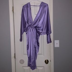 Beautiful purple dress. Looks and feels like silk! Size S